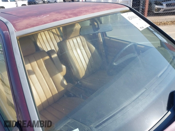 1987 Mercedes-Benz 190 z VIN WDBDB26D9HF306901, wystawiony jako IAAI lot #42018142 z przebiegiem 190 364 mil mil oraz . Historia ofert i sprzedaży dostępna na DreamBid. Obrazek 13.