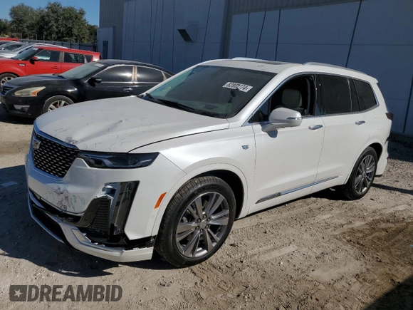 2024 Cadillac XT6 FWD Premium Luxury with VIN 1GYKPCRS4RZ742995, listed as a Copart auction lot 82802774 with 5,898 mi miles and Salvage Title. Bid and sale history available at carsss.com. Image 1.