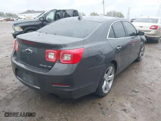 2013 Chevrolet Malibu LTZ with VIN 1G11H5SA1DF286288, listed as a IAAI auction lot 40457277 with 216,703 mi miles. Bid and sale history available at carsss.com. Image 4.