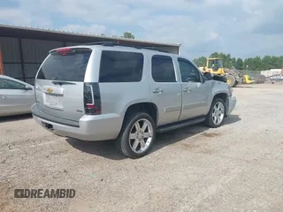 2012 Chevrolet Tahoe LT with VIN 1GNSKBE03CR124911, listed as a IAAI auction lot 40066894 with 151,551 mi miles and . Bid and sale history available at DreamBid. Image 4.