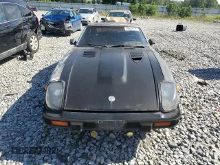 1982 Datsun 280ZX z VIN JN1HZ04S1CX447813, wystawiony jako Copart lot #56649125 z przebiegiem 285 290 mil mil oraz Tytuł czysty. Historia ofert i sprzedaży dostępna na DreamBid. Obrazek 5.