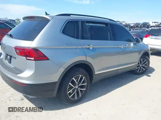 2020 Volkswagen Tiguan SE with VIN 3VV3B7AX8LM077472, listed as a IAAI auction lot 41933521 with 52,028 mi miles and . Bid and sale history available at DreamBid. Image 4.