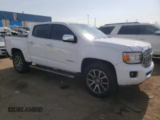 2020 GMC Canyon 4WD Denali with VIN 1GTG6EEN1L1232751, listed as a Copart auction lot 74719334 with 115,105 mi miles and Salvage Title. Bid and sale history available at carsss.com. Image 4.