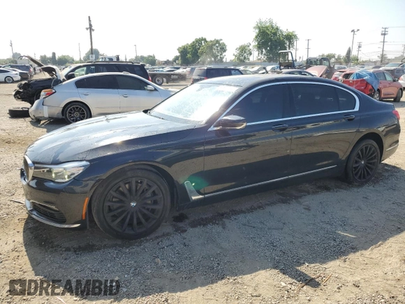 2016 BMW 7 Series 740i z VIN WBA7E2C58GG738940, wystawiony jako Copart lot #60503595 z przebiegiem 99 654 mil mil oraz Szkoda całkowita • Salvage title. Historia ofert i sprzedaży dostępna na DreamBid. Obrazek 1.