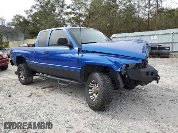 1999 Dodge Ram 2500 with VIN 1B7KF2363XJ504002, listed as a Copart auction lot 73557954 with 297,618 mi miles and Salvage Title. Bid and sale history available at carsss.com. Image 4.