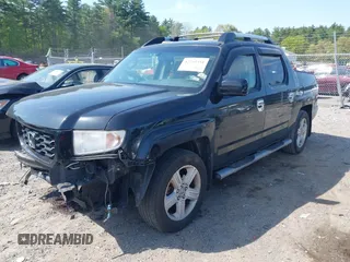 2010 Honda Ridgeline RTL z VIN 5FPYK1F56AB003730, wystawiony jako IAAI lot #42255351 z przebiegiem 190 630 mil mil oraz . Historia ofert i sprzedaży dostępna na DreamBid. Obrazek 2.