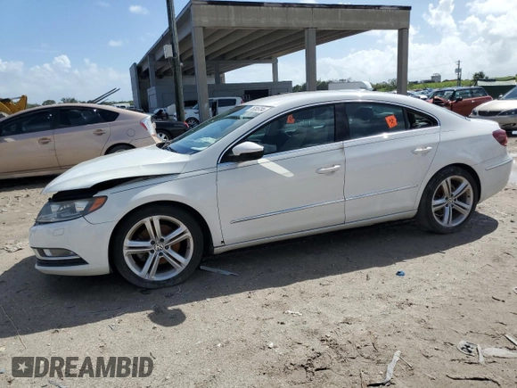 2013 Volkswagen CC Sport with VIN WVWBN7AN7DE522906, listed as a Copart auction lot 76385704 with 101,063 mi miles and Salvage Title. Bid and sale history available at DreamBid. Image 1.