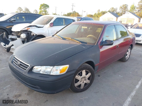 2000 Toyota Camry CE with VIN 4T1BG22K9YU688451, listed as a IAAI auction lot 42066777 with 210,221 mi miles. Bid and sale history available at carsss.com. Image 2.