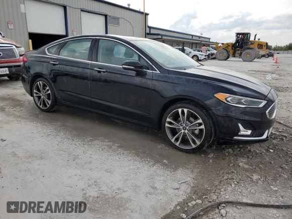 2020 Ford Fusion Titanium with VIN 3FA6P0D90LR192500, listed as a Copart auction lot 53746345 with 135,636 mi miles and Salvage title. Bid and sale history available at DreamBid. Image 4.