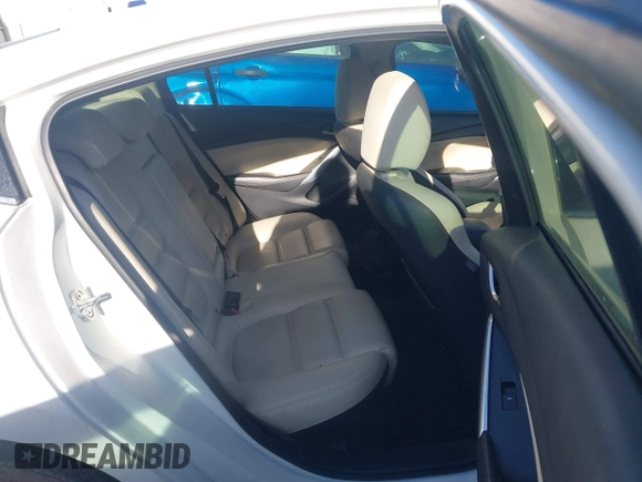 2015 Mazda 6 i Grand Touring with VIN JM1GJ1W54F1202766, listed as a IAAI auction lot 41860197 with Not Provided miles and . Bid and sale history available at DreamBid. Image 8.