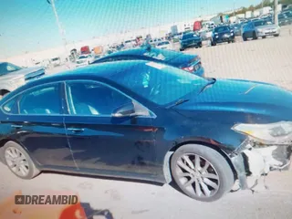 2014 Toyota Avalon Limited with VIN 4T1BK1EB4EU096164, listed as a IAAI auction lot 40904808 with 242,086 mi miles. Bid and sale history available at carsss.com. Image 12.