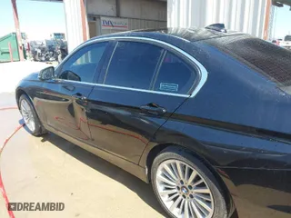 2014 BMW 3 Series 328i xDrive with VIN WBA3B5C50EF599480, listed as a IAAI auction lot 41755762 with 200,361 mi miles. Bid and sale history available at carsss.com. Image 14.