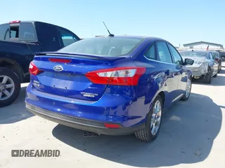2013 Ford Focus Titanium with VIN 1FADP3J25DL163591, listed as a IAAI auction lot 41973388 with 133,071 mi miles and . Bid and sale history available at carsss.com. Image 4.