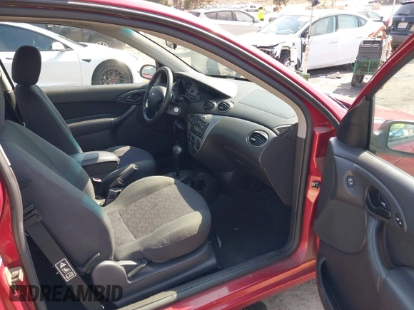2003 Ford Focus ZX3 with VIN 3FAHP31323R119865, listed as a IAAI auction lot 42738163 with 64,008 mi miles and . Bid and sale history available at DreamBid. Image 5.