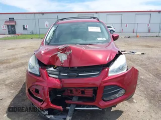 2014 Ford Escape SE with VIN 1FMCU0GX5EUB58169, listed as a IAAI auction lot 42155452 with 89,002 mi miles and . Bid and sale history available at DreamBid. Image 12.
