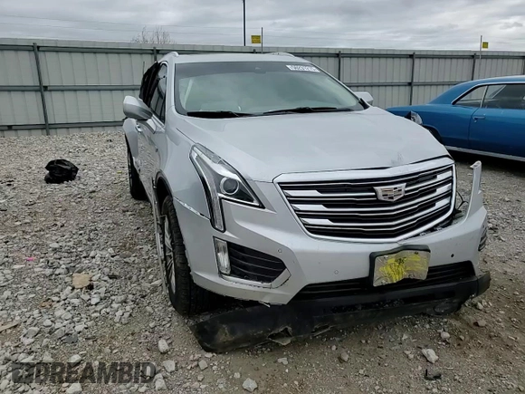 2017 Cadillac XT5 Luxury FWD with VIN 1GYKNBRS7HZ263985, listed as a Copart auction lot 50231215 with 28,542 mi miles and Salvage Title. Bid and sale history available at DreamBid. Image 12.