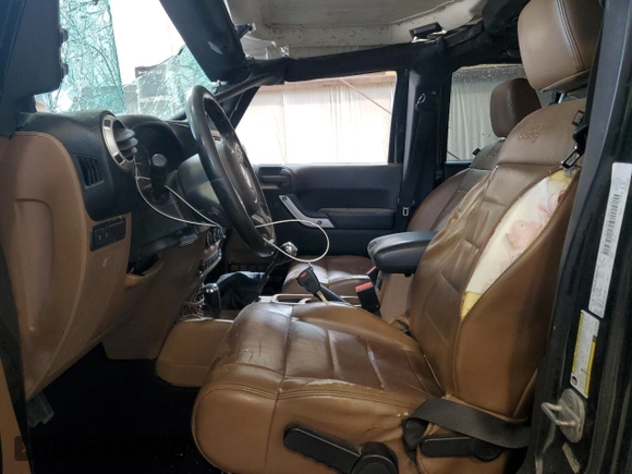 2012 Jeep Wrangler Unlimited Rubicon with VIN 1C4HJWFG4CL119390, listed as a Copart auction lot 60026425 with 305,189 mi miles and Salvage title. Bid and sale history available at DreamBid. Image 7.