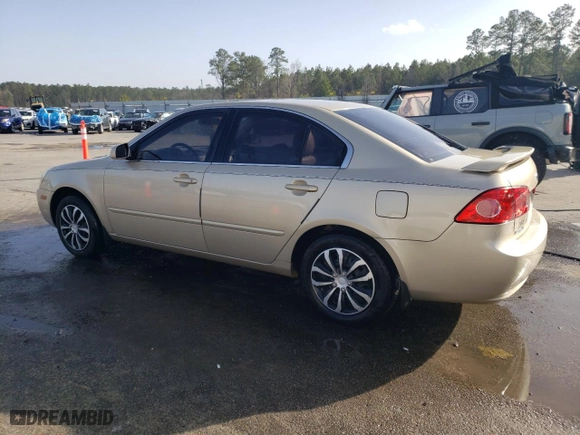2008 Kia Optima LX with VIN KNAGE123985269767, listed as a Copart auction lot 47660265 with 176,677 mi miles and Salvage Title. Bid and sale history available at carsss.com. Image 2.