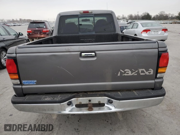 1998 Mazda B-Series Truck SX z VIN 4F4YR12C9WTM39637, wystawiony jako Copart lot #82752154 z przebiegiem 207 959 mil mil oraz Szkoda całkowita • Salvage title. Historia ofert i sprzedaży dostępna na DreamBid. Obrazek 6.