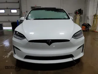 2023 Tesla Model X with VIN 7SAXCDE5XPF381338, listed as a Copart auction lot 51638855 with 1,570 mi miles and Clean Title. Bid and sale history available at carsss.com. Image 5.