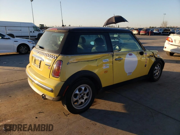 2002 MINI Hardtop with VIN WMWRC33422TC35953, listed as a Copart auction lot 42347465 with 126,890 mi miles and Salvage Title. Bid and sale history available at DreamBid. Image 3.