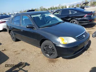 2001 Honda Civic LX with VIN JHMES16541S006574, listed as a IAAI auction lot 42162269 with 219,680 mi miles. Bid and sale history available at carsss.com. Image 1.