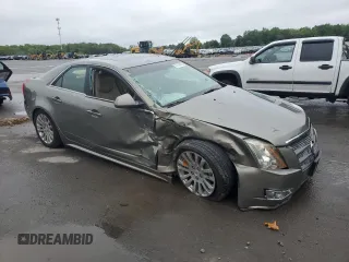 2010 Cadillac CTS Premium with VIN 1G6DS5EV3A0116911, listed as a Copart auction lot 57394905 with 126,084 mi miles and Salvage title. Bid and sale history available at DreamBid. Image 4.