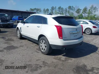2013 Cadillac SRX Luxury Collection with VIN 3GYFNCE33DS608040, listed as a IAAI auction lot 41912860 with 128,295 mi miles and . Bid and sale history available at DreamBid. Image 3.