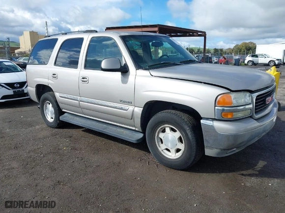 2004 GMC Yukon SLT with VIN 1GKEC13V74J311617, listed as a IAAI auction lot 41785561 with 225,245 mi miles. Bid and sale history available at carsss.com. Image 1.