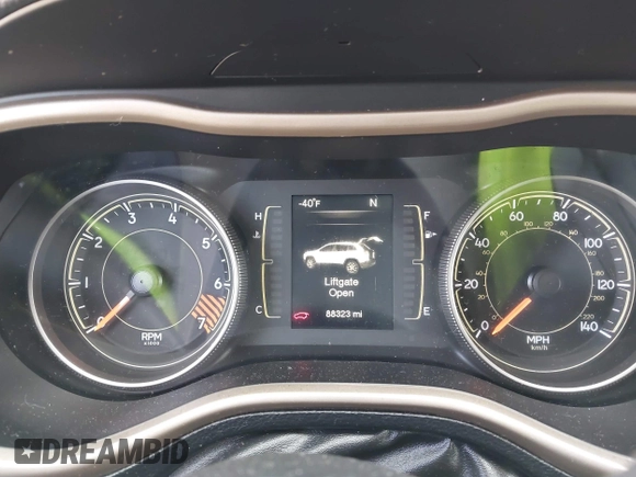 2015 Jeep Cherokee Sport with VIN 1C4PJLAB2FW696010, listed as a IAAI auction lot 42032956 with 88,323 mi miles. Bid and sale history available at carsss.com. Image 7.
