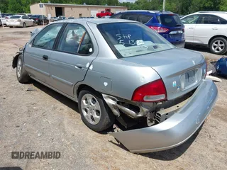 2003 Nissan Sentra XE z VIN 3N1CB51D43L714603, wystawiony jako IAAI lot #42392644 z przebiegiem 201 656 mil mil oraz . Historia ofert i sprzedaży dostępna na DreamBid. Obrazek 3.