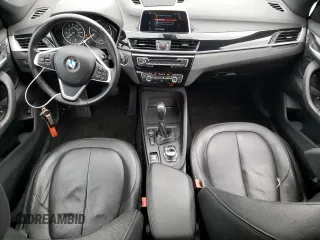 2018 BMW X1 xDrive28i with VIN WBXHT3C33J5K23187, listed as a Copart auction lot 71063192 with 97,403 mi miles. Bid and sale history available at carsss.com. Image 8.
