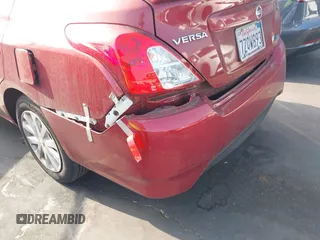 2016 Nissan Versa SV with VIN 3N1CN7AP0GL866431, listed as a IAAI auction lot 41017735 with 104,683 mi miles. Bid and sale history available at carsss.com. Image 12.