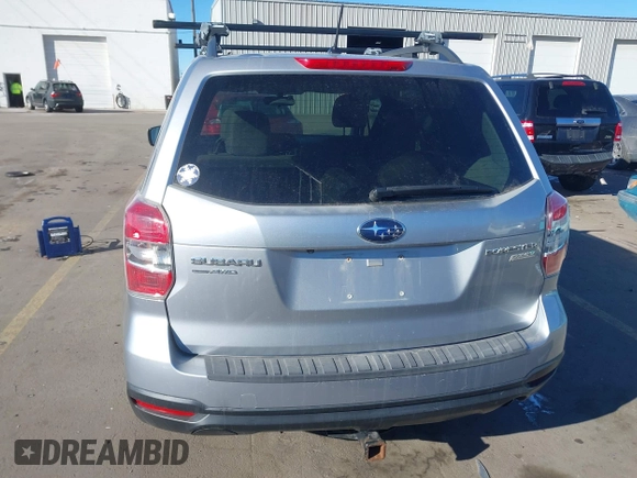 2014 Subaru Forester Premium with VIN JF2SJAEC4EH555249, listed as a IAAI auction lot 41369482 with 175,734 mi miles and . Bid and sale history available at DreamBid. Image 15.