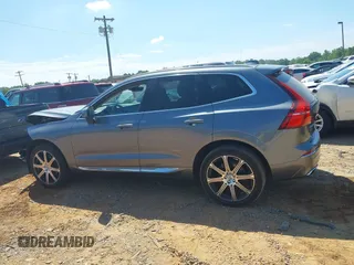2021 Volvo XC60 Inscription z VIN YV4102RL0M1865805, wystawiony jako IAAI lot #42211072 z przebiegiem 52 991 mil mil oraz . Historia ofert i sprzedaży dostępna na DreamBid. Obrazek 14.