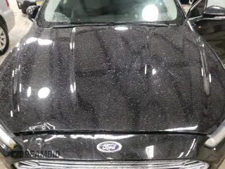 2015 Ford Fusion SE with VIN 3FA6P0HD7FR290488, listed as a Copart auction lot 58790315 with 111,435 mi miles and Salvage title. Bid and sale history available at DreamBid. Image 11.