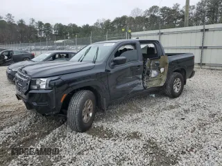 2024 Nissan Frontier SV z VIN 1N6ED1EJ6RN610001, wystawiony jako Copart lot #86741134 z przebiegiem 4 560 mil mil oraz Szkoda całkowita • Salvage title. Historia ofert i sprzedaży dostępna na DreamBid. Obrazek 1.
