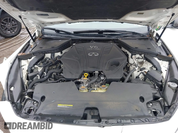 2020 Infiniti Q50 Red Sport 400 with VIN JN1FV7AR0LM660315, listed as a IAAI auction lot 41951851 with 102,475 mi miles and . Bid and sale history available at carsss.com. Image 10.
