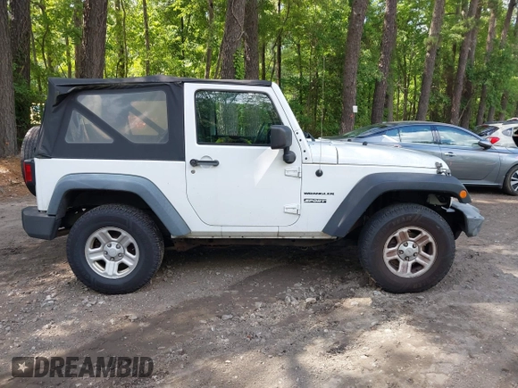 2012 Jeep Wrangler Sport with VIN 1C4AJWAG7CL192200, listed as a IAAI auction lot 42472398 with 198,999 mi miles and . Bid and sale history available at DreamBid. Image 13.