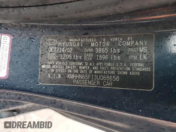 2003 Hyundai Tiburon GT z VIN KMHHN65F13U068658, wystawiony jako Copart lot #81799404 z przebiegiem 163 148 mil mil oraz Szkoda całkowita • Salvage title. Historia ofert i sprzedaży dostępna na DreamBid. Obrazek 12.