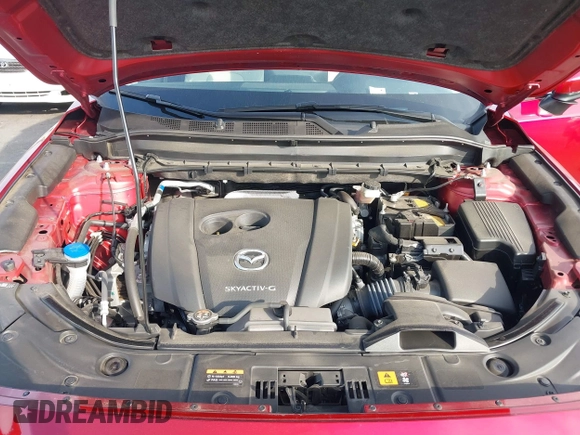 2023 Mazda CX-5 S Premium with VIN JM3KFBDM2P0130525, listed as a IAAI auction lot 41479518 with 18,145 mi miles and . Bid and sale history available at DreamBid. Image 10.