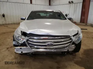 2013 Ford Taurus SEL z VIN 1FAHP2E82DG174647, wystawiony jako Copart lot #53784995 z przebiegiem Nie podano mil oraz Szkoda całkowita • Salvage title. Historia ofert i sprzedaży dostępna na DreamBid. Obrazek 5.