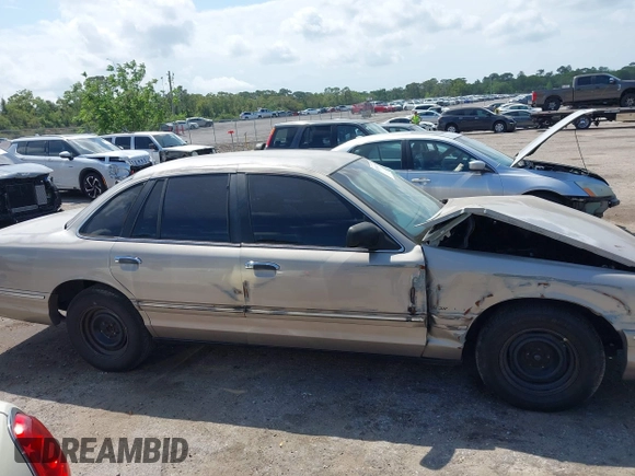 1995 Ford Crown Victoria с VIN 2FALP73W5SX140346, выставлен на аукционе IAAI как лот 41974429 с пробегом 166 540 миль миль и . История ставок и продаж доступна на DreamBid. Изображение 13.
