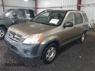 2005 Honda CR-V LX with VIN JHLRD68565C001659, listed as a IAAI auction lot 42162314 with 155,212 mi miles and . Bid and sale history available at carsss.com. Image 2.