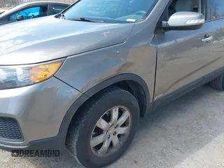 2011 Kia Sorento LX with VIN 5XYKTCA1XBG032086, listed as a IAAI auction lot 42026859 with 177,449 mi miles. Bid and sale history available at carsss.com. Image 6.
