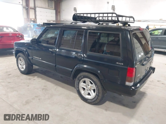 2001 Jeep Cherokee Sport z VIN 1J4FF58S11L562933, wystawiony jako IAAI lot #41944672 z przebiegiem 163 078 mil mil oraz . Historia ofert i sprzedaży dostępna na DreamBid. Obrazek 3.
