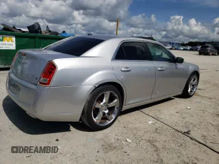 2012 Chrysler 300 S z VIN 2C3CCABG2CH140432, wystawiony jako Copart lot #60916765 z przebiegiem 170 042 mil mil oraz Czysty tytuł • Clean title. Historia ofert i sprzedaży dostępna na DreamBid. Obrazek 3.