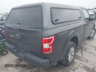 2018 Ford F-150 XL with VIN 1FTMF1C53JKE85608, listed as a IAAI auction lot 41823771 with 142,151 mi miles. Bid and sale history available at carsss.com. Image 4.