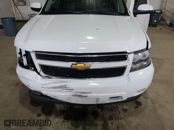 2012 Chevrolet Tahoe LT z VIN 1GNSKBE06CR157112, wystawiony jako Copart lot #55932895 z przebiegiem 185 934 mil mil oraz Szkoda całkowita • Salvage title. Historia ofert i sprzedaży dostępna na DreamBid. Obrazek 12.
