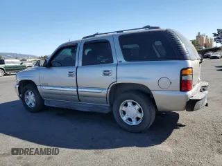 2005 GMC Yukon SLE with VIN 1GKEC13T95J150381, listed as a Copart auction lot 77405144 with 176,516 mi miles and Clean Title. Bid and sale history available at carsss.com. Image 2.
